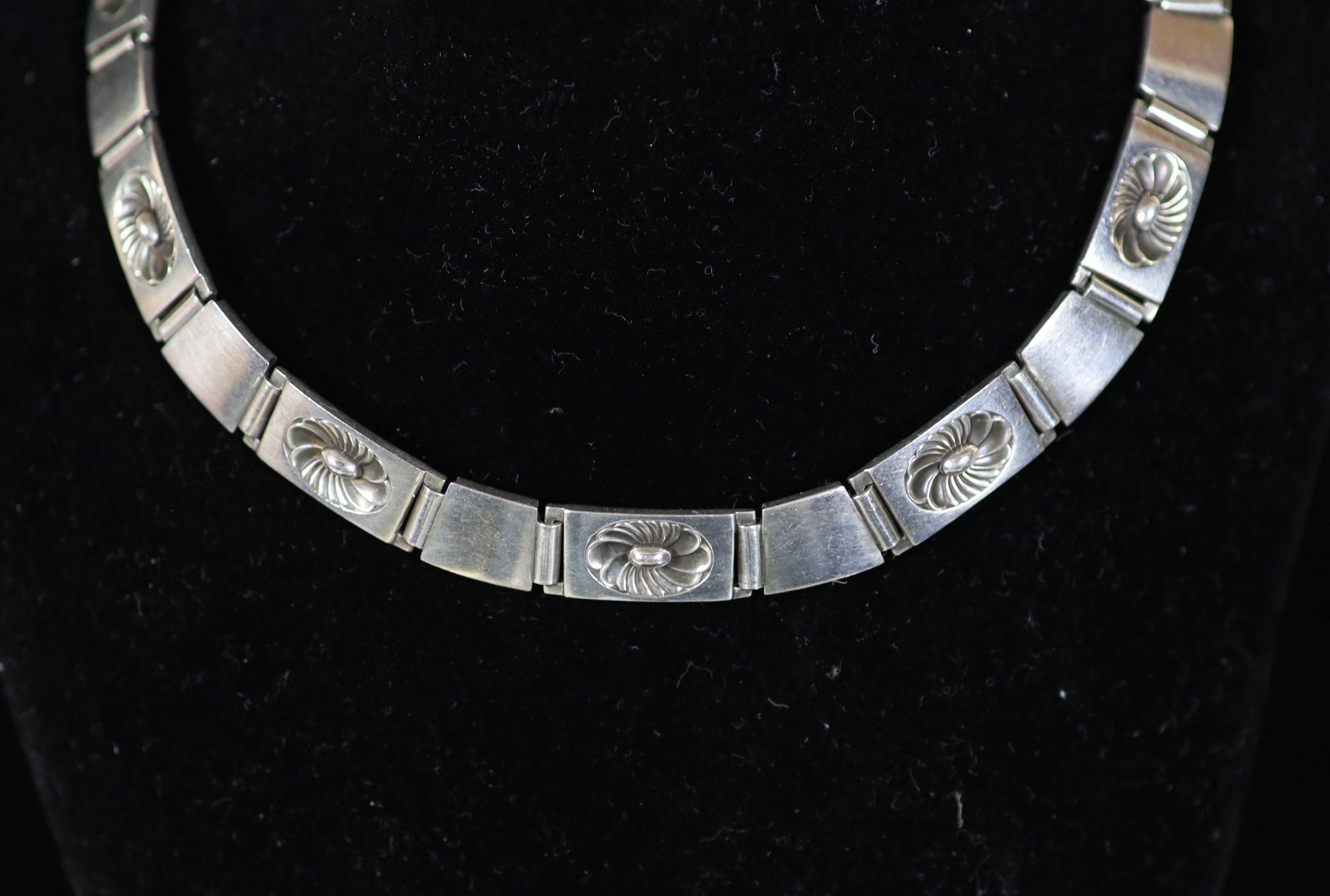 A mid 20th century Georg Jensen sterling silver necklace and matching bracelet, design no. 56 B & 60B